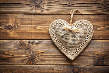 Handmade burlap heart Christmas decoration with lace details

