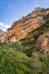Pasarelas del Vero, walkways and footbridges along a scenic gorge with turquoise water in Alquézar, Huesca, Spain