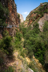 Pasarelas del Vero, walkways and footbridges along a scenic gorge with turquoise water in Alquézar, Huesca, Spain