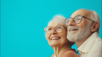 Happy pensioners smiling together and looking into the distance into bright future. Happy retirement, old people, retirement age and activity, new life
