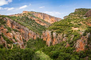 Pasarelas del Vero, walkways and footbridges along a scenic gorge with turquoise water in Alquézar, Huesca, Spain