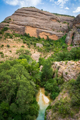 Pasarelas del Vero, walkways and footbridges along a scenic gorge with turquoise water in...