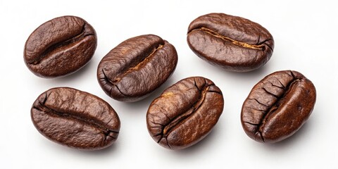 Obraz premium Closeup of roasted coffee beans arranged in a scattered pattern on a pristine white surface