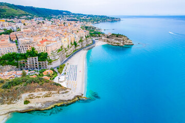 Fototapeta premium Tropea, Calabria, Italy. Church of Santa Maria dell'Isola. Monastery and coastline with azure crystal-clear water