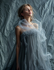 Obraz premium Ethereal Figure Shrouded in Translucent Veils
