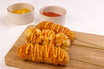 Delicious Crunchy Korean Style Chunky Potato Corndogs and Mozarella Corndogs. 