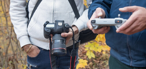 Caucasian man using drone controller.