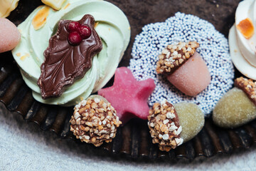 Festive Holiday Treats Displayed on a Rustic Plate for Christmas