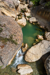 Pasarelas del Vero, walkways and footbridges along a scenic gorge with turquoise water in...