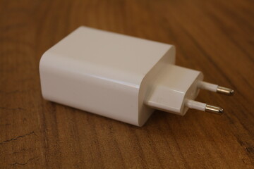 White fast charging adapter with USB port