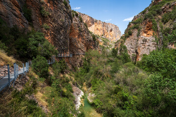 Pasarelas del Vero, walkways and footbridges along a scenic gorge with turquoise water in Alquézar, Huesca, Spain