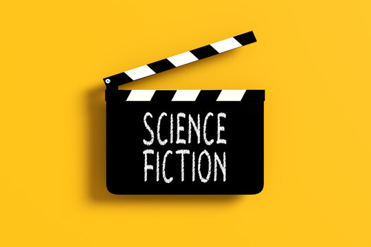 Movie clapperboard with science fiction genre written on it over yellow background