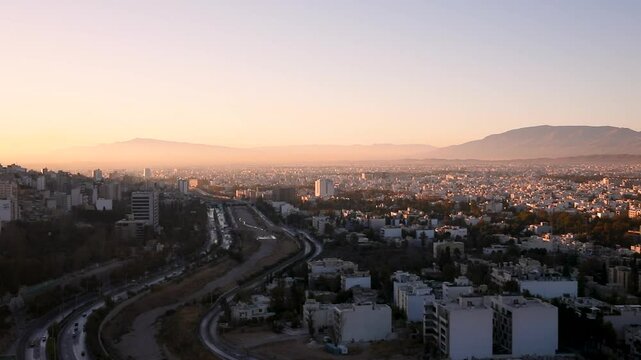 Aerial view of skyline and cityscape of historical city of Shiraz at sunrise, Shiraz, Fars Province, Iran, known as City of Love and Literature.