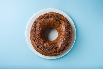 Top view of cocoa, walnut, chocolate carrot and cinnamon bundt cake