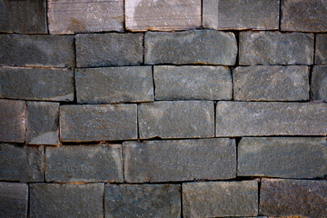 Grey brick wall and rough sand stone wall background