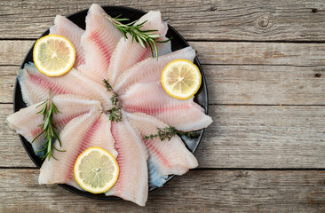 Raw tilapia fillet photography . Top view