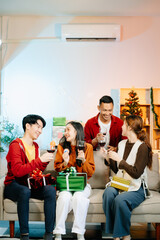 Friends celebrate Christmas with gift exchanges, festive food, and laughtera perfect scene for holiday and New Year
