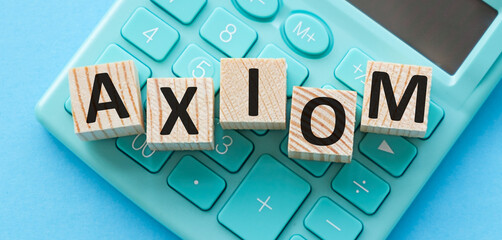 A calculator with the letters AXIOM written on it
