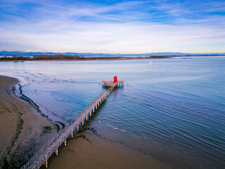 Winter in Lignano Sabbiadoro. The sea, its colors and its geometries from above.