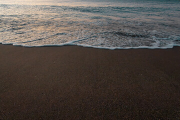 beautiful sunrise on the sea with waves