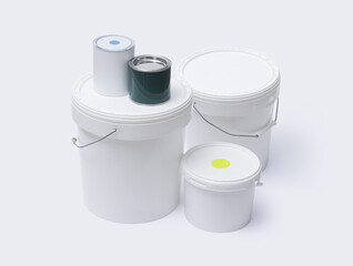 Set of paint buckets and varnish tins © stokkete