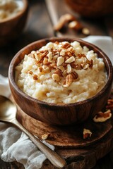 Creamy rice pudding with chopped pecans, a wholesome and delightful dessert.