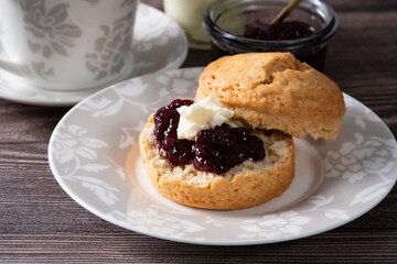 Afternoon tea with homemade scone 1 -  blue wood backbround 1