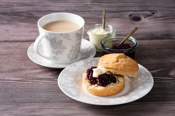 Tea time  with homemade scone 1 -  wood backbround 1