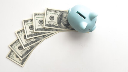 Piggy bank on money backround. Top view. saving concept