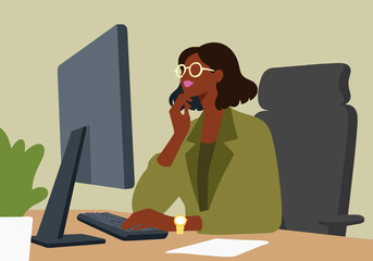 Thoughtful businesswoman with hand on chin sitting at desk and working at office