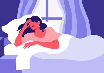 Restless woman lying on bed at home