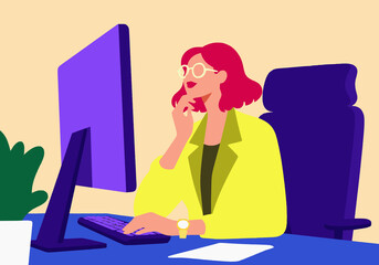 Businesswoman working on computer at desk in office