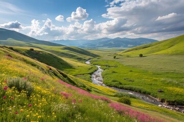 Obraz premium Vibrant Spring Landscape with Rolling Green Hills and Colorful Wildflowers in a Bright Blue Sky