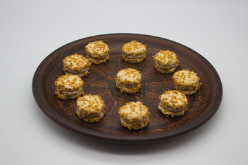 Mini desserts with cream filling and nuts