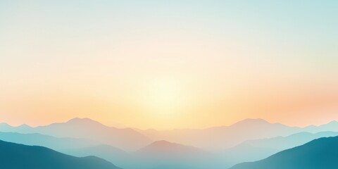 Obraz premium Serene mountain landscape at sunrise with soft pastel colors in the sky.