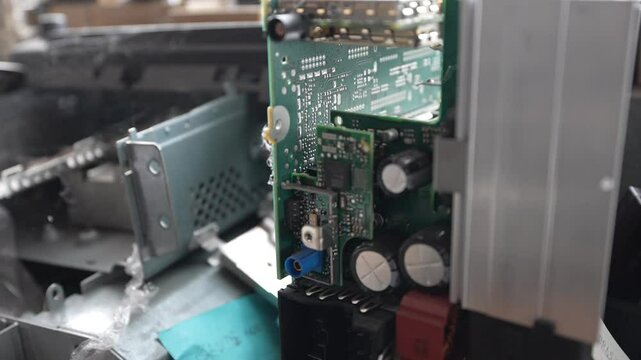 Old outdated electronics from vintage car sitting on the shelf