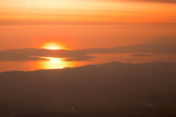 Aerial sunset, sunrise over sea, Athens, Greece