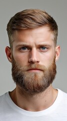 Obraz premium A man with a beard and blue eyes