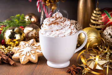 Hot chocolate, latte coffee or eggnog cocktail with whipped cream