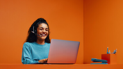 Call operator with blue colorblocking elements in a vibrant monochromatic office
