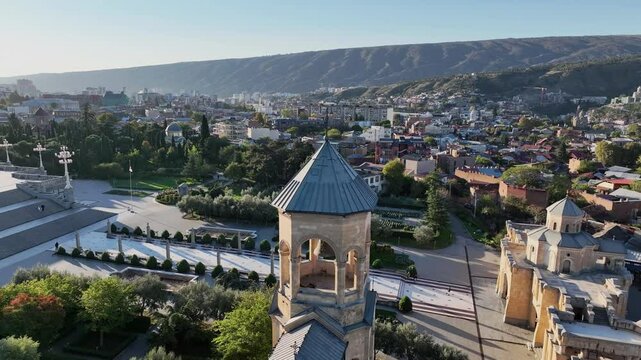 Holy Trinity Cathedral or Tsminda Sameba Church aerial panoramic view in Tbilisi old town. Tbilisi is the capital and the largest city of Georgia