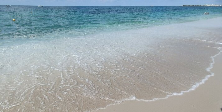 Crystal clear water at Mari Ermi beach in Sardinia Italy