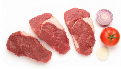 Fresh raw beef steaks with vegetables on white background