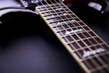 Fototapeta premium Fretboard of modern electric guitar. Close up. 