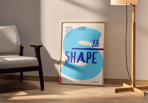 Mockup Of Customizable Vertical Framed Artwork Leaning By Wall