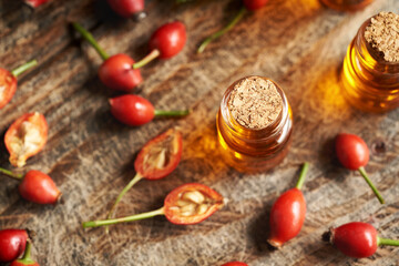 Rose hip seed oil in a glass bottle