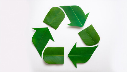 Green leaf textured recycling sign on white background. Top view.