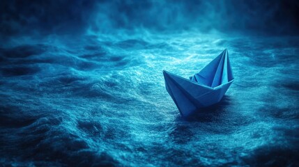 Obraz premium A solitary paper boat glides through the mysterious blue waves under a twilight sky