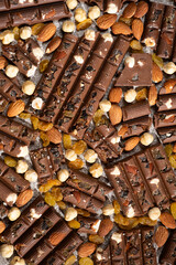 Close-up of milk nut chocolate. Healthy sweets, lactose-free and sugar-free chocolate