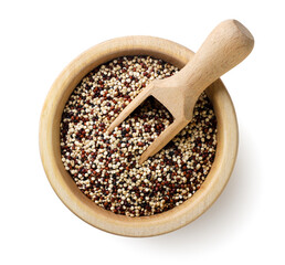 Quinoa mix in a wooden plate on a white background. Top view